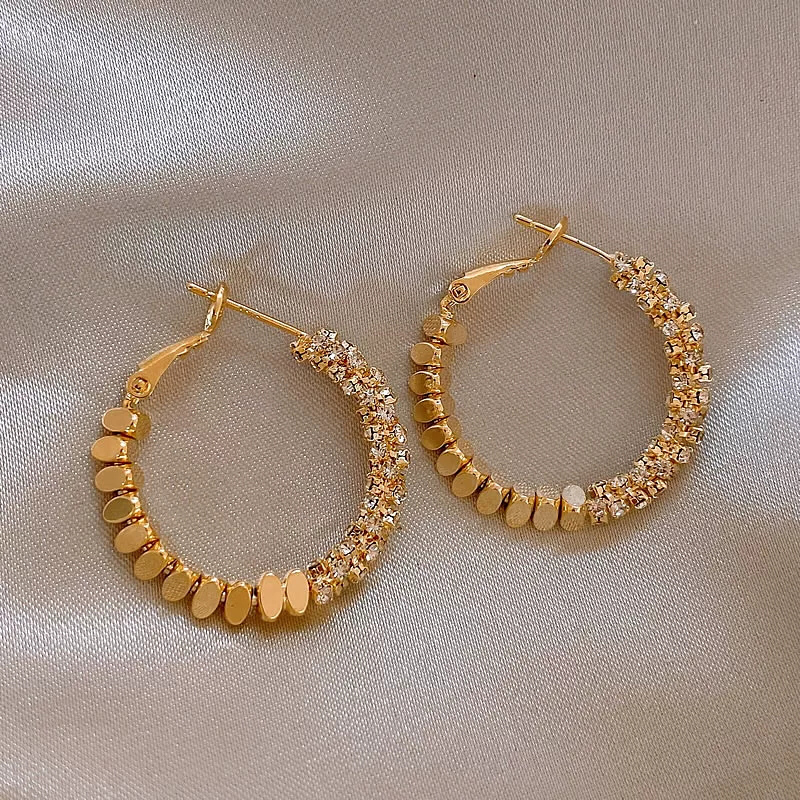 Pendientes atractivos circulares de aleación y cobre para mujer